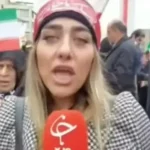 عکس جنجالی از راهپیمایی ۲۲ بهمن / واکنش زنان چادری به حجاب یک دختر